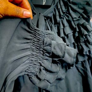 Beautiful sheer black ruffle pussy bow top